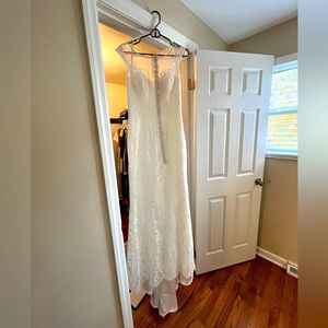 Never worn/altered wedding dress